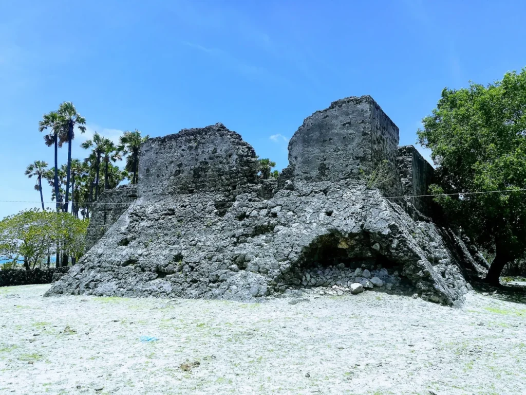 Weathered pale stone walls of the historic fort ruins on Delft Island, Sri Lanka