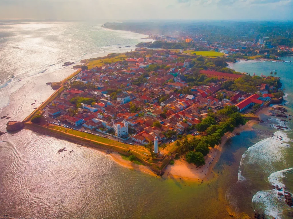 Aerial view of Galle Fort with red-roofed buildings, coastal ramparts and the surrounding sea, Sri Lanka
